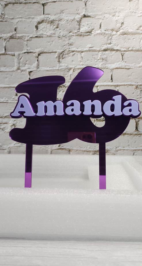 Custom mirrored acrylic cake topper featuring a number and a name on top